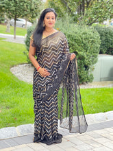 Load image into Gallery viewer, Black sequence saree with gold sequence blouse
