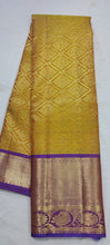 Load image into Gallery viewer, Yellow and purple combination pure kanchi silk saree with stitched blouse !
