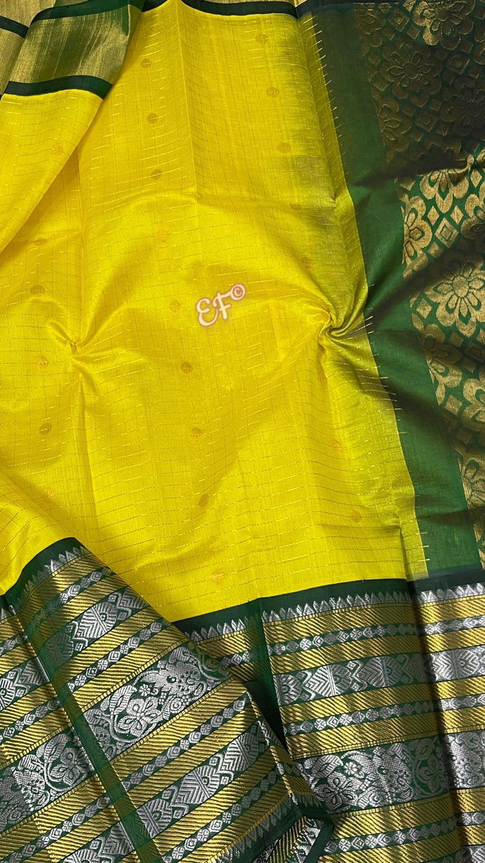Yellow with dark green border Kupaddam silk saree with stitched blouse