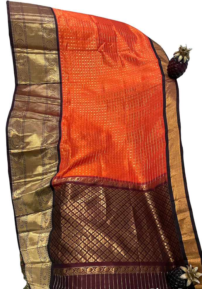 Orange with brown border Kupaddam silk saree with stitched blouse