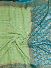 Load image into Gallery viewer, Light Green Khaddi Georgette Saree With Stitched  Blouse
