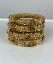 Load image into Gallery viewer, Gold color Thin Raw Silk Bangles Set of 4
