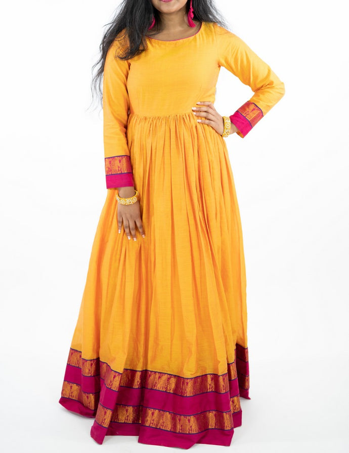 Mustard Yellow Long Dress With Pink Zari Border